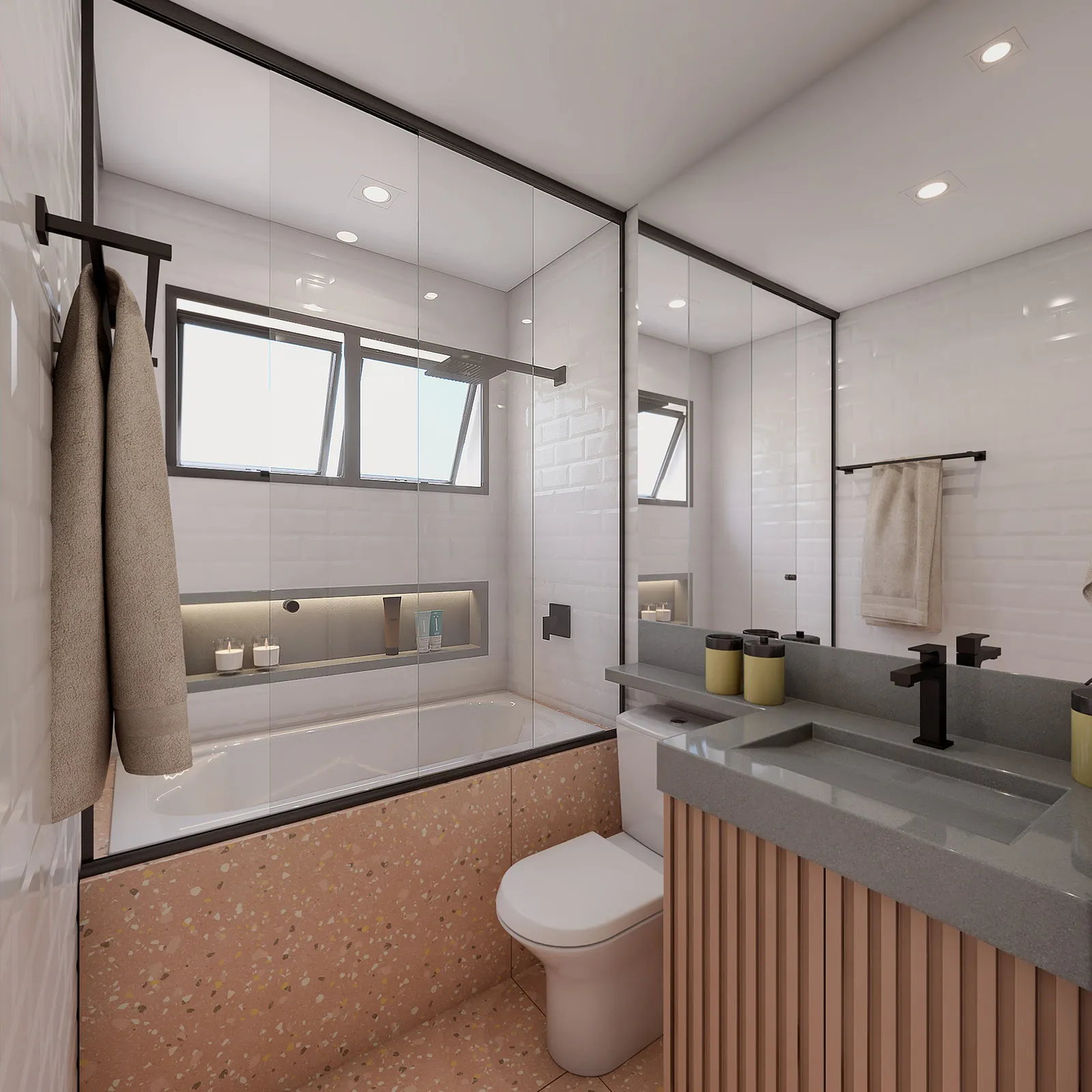 Banheiro com azulejo branco tipo metrô, banheira com painel de vidro, nicho iluminado, revestimento de granilite rosé, bancada cinza e marcenaria ripada
