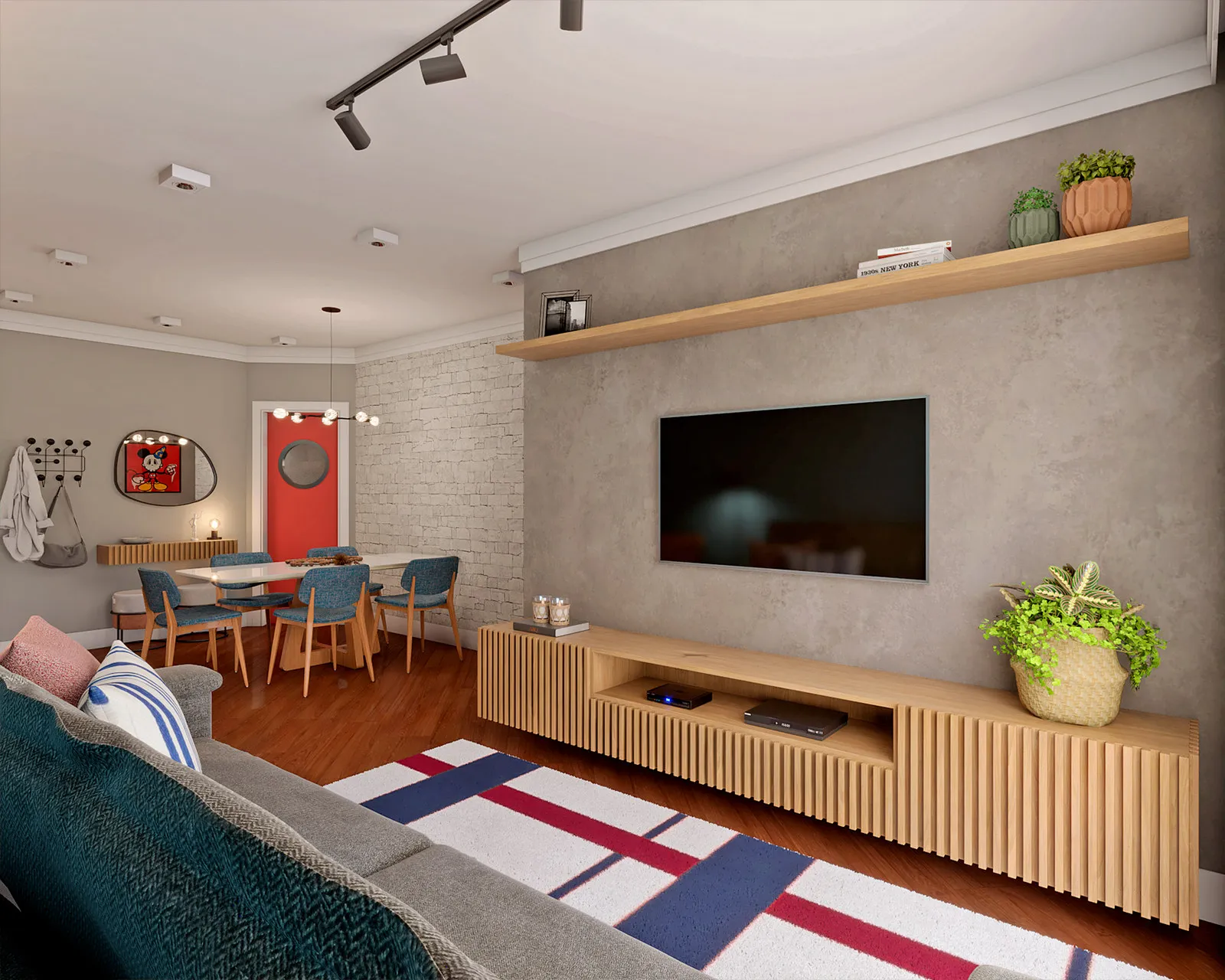 Living integrado com painel de TV em cimento queimado, rack ripado de madeira e tapete xadrez, com a sala de jantar e a porta vermelha ao fundo
