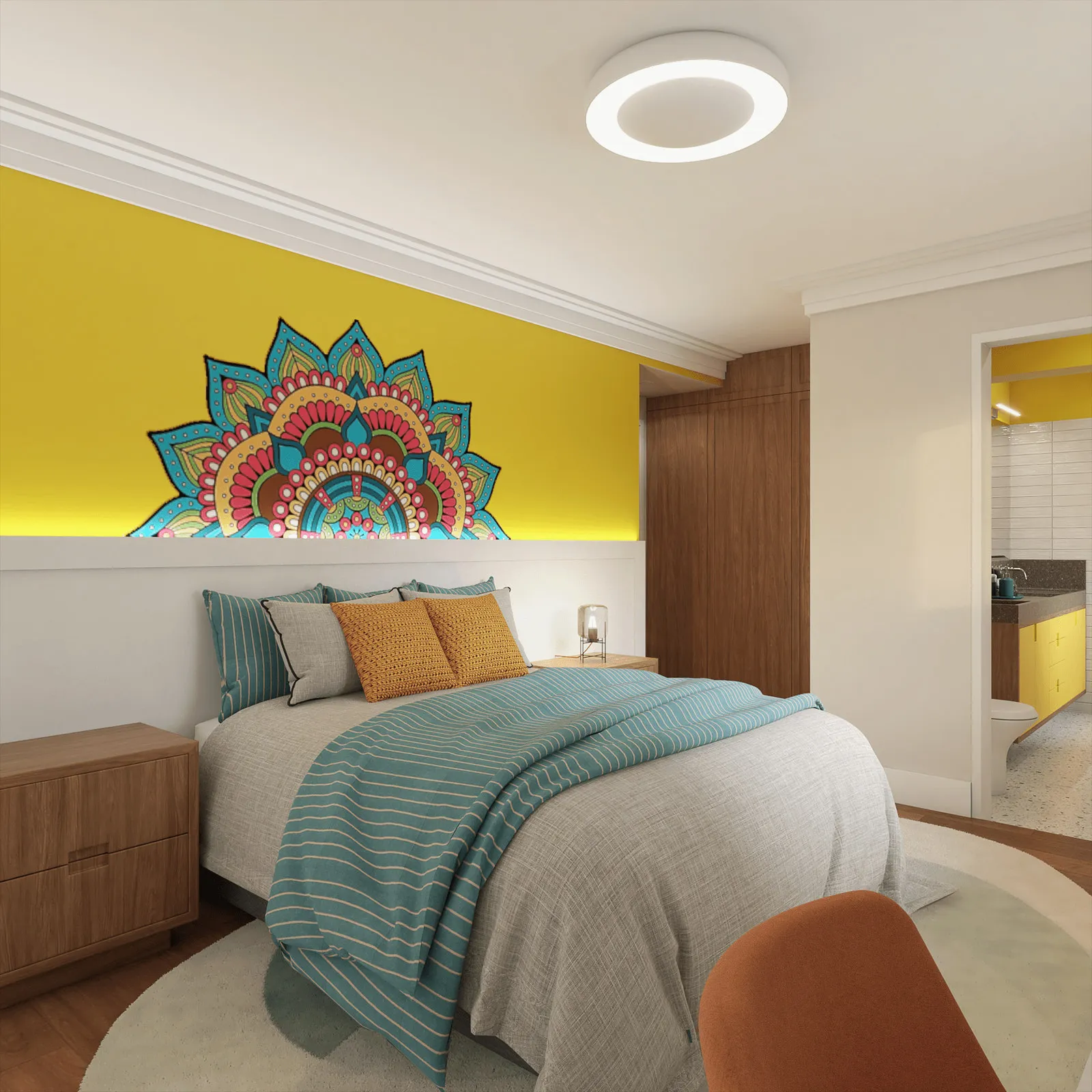 Quarto com mandala colorida na parede amarela, roupa de cama cinza e turquesa, criados de madeira e banheiro ao fundo