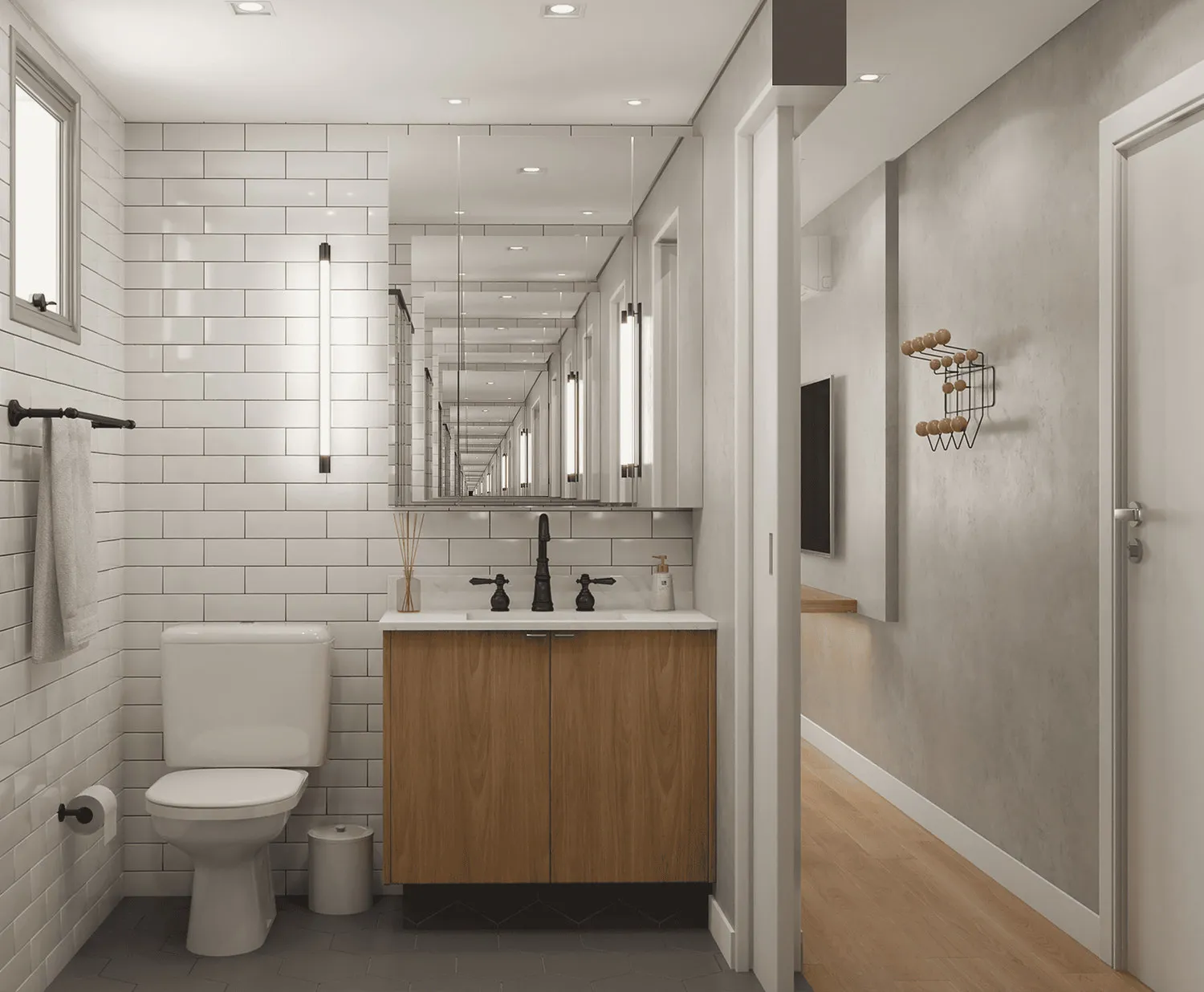 Lavabo com azulejo de metrô branco, vaso, bancada de madeira com cuba, espelheira ampla e piso hexagonal cinza